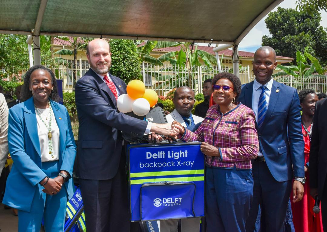 USA Ambassador (William Popp) & Minister of Health,Dr.Jane Ruth Aceng, at the Joint hand over 
                of the DELFT lights